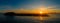 Stunning mid aspect aerial panoramic view of the early morning sunrise over the island of Lobos near Corralejo in Fuerteventura