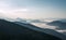 Stunning morning landscape view of the fog river flowing by the valley between the mountains. Mala Fatra mountains, Slovak