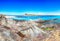 Stunning morning view of Famous La Pelosa beach and rocky shore near Torre della Pelosa