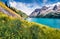 Stunning morning view of Fedaia lake. Colorful summer scene of Dolomiti Alps, Gran Poz location, Trentino-Alto Adige/Sudtirol