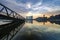 Stunning morning view near the lakeside, modern building and wooden jetty