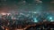 A stunning night view showcasing the illuminated city skyline as seen from a hill, Panoramic view of a cityscape bursting with