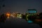 Stunning nighttime urban landscape of tall buildings illuminated against the night sky