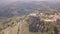 Stunning orbit 4k aerial of rock with Catholic cross in Bova, Calabria, Italy