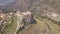 Stunning orbit 4k aerial of rock with Catholic cross in Bova, Calabria, Italy