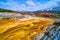 Stunning overlook at Yellowstone of colorful springs and terraces in winter