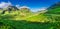 Stunning panorama in Glencoe at sunrise with shadow of man, Scotland