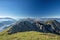 Stunning panorama view of a gorgeous Alpine mountain range on a sunny autumn day
