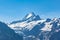 Stunning panorama view of Schreckhorn above Grindelwald on a sunny summer day, a famous mountain above 4000m of Swiss Alps on