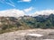 Stunning panorama view of  Swiss Alps mountains in Canton of Ticino on hiking path towards reservoir lake Lago di Robiei,  on