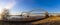 A stunning panoramic shot of the Memphis-Arkansas Bridge over the vast flowing waters of the Mississippi river