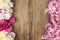 Stunning peonies on wooden background