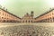 The stunning Piazza Ducale in Vigevano in autumn while raining