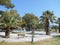 Stunning promenade in Asprovalta, Greece with palm trees and fountain