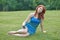 Stunning red haired woman outside - summer