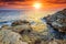 Stunning rocky beach and beautiful sunset near Rovinj,Istria,Croatia