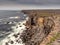 Stunning rough stone cliff and Atlantic ocean. Aran island, county Galway, Ireland. Rugged coastline. Irish nature scene. Popular