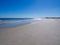 Stunning sandy beach on the Atlantic coast in South Carolina, USA, with clear, blue sky