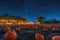 A stunning scene of a field filled with pumpkins illuminated by the night sky, A brightly lit pumpkin patch under a starry night