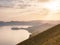 Stunning scenery in the sunset rays of the sea coast and mountains