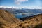 Stunning scenic views of the bays of Lake Wanaka and the snow capped Southern Alps from the Roys Peak mountain track