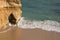 Stunning sea caves cliffs on sandy camilo beach