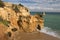 Stunning sea caves cliffs on sandy camilo beach