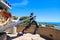 A stunning shot of the The Hide Drogher statue on the Dana Point Bluff Top Trail with a majestic view of the blue ocean water