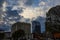 A stunning shot of the skyscrapers and office buildings in the cityscape with powerful clouds at sunset in downtown Nashville