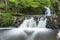 Stunning Slow falling Water Hallamolla Waterfall in lush rural Forest