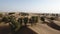 A stunning snap shot of the drone in the Hema Desert, trees, drylands and red dunes, Sultanate of Oman