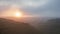 Stunning Summer sunrise from Devil\'s Dyke in South Downs National Park in English countryside