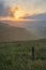 Stunning Summer sunrise from Devil\'s Dyke in South Downs National Park in English countryside