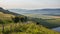 Stunning Summer sunset from Firle Beacon in South Downs National Park in beautiful English countryside