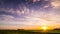 Stunning sun rise over a Dutch meadow on a gold winter morning