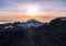 Stunning sunrise view of Mawenzi Peak across the crater at the summit of Kilimanjaro taken from Uhuru Peak