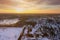 Stunning at sunset aerial view of American small town after snowfall snow scenery
