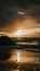 Stunning sunset over a rocky beach shoreline, with the glistening ocean waters in the background