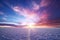 Stunning sunset over the salt flats of Uyuni in