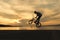 Stunning tricks of bmx biker against the sunset.