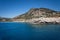 Stunning Tsambika Beach and Rock Formations of Rhodes Viewed from the Mediterranean Sea