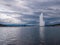 Stunning viev of famous fountain Jet d'Eau in Geneva city on Geneva lake