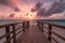 A stunning view of Adraga Beach, located in Portugal, photographed during a colorful sunset