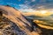 Stunning view at alpine sunset in french alps near Aiguille de Bionnassay peak, Mont Blanc massif, France