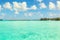 Stunning view of blue turquoise lagoon and far bungalows on background of Bora Bora island, French Polynesia