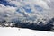 A stunning view in the clouds opens to the Main Caucasian ridge from the southern slope of Elbrus.