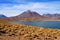 Stunning view of deep blue color Miscanti lake with Cerro Miscanti mountain in background, Northern Chile