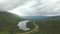 Stunning View of Emerald Lake and Scenic Road from Above