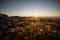 Stunning view of a grassy field in the sunset light, with beautiful dewdrops