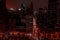 Stunning view of the illuminated downtown skyline at night from the top of a tall building, Chicago